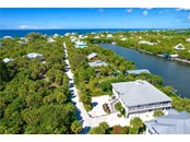 Aerial View of Home. - Single Family Home for sale at 62 Tarpon Way, Placida, FL 33946 - MLS Number is D6121925