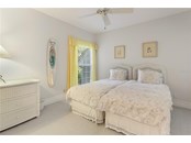 Lower level guest bedroom - Single Family Home for sale at 122 Carrick Bend Ln, Boca Grande, FL 33921 - MLS Number is D6122010