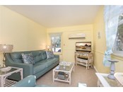 Living Room in Lower Rental Unit - Duplex/Triplex for sale at 4076 N Beach Rd #10 & 11, Englewood, FL 34223 - MLS Number is D6122744