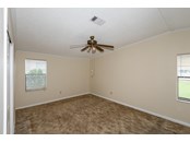 Master bedroom - Manufactured Home for sale at 3226 Wekiva Rd, Tavares, FL 32778 - MLS Number is G5046664