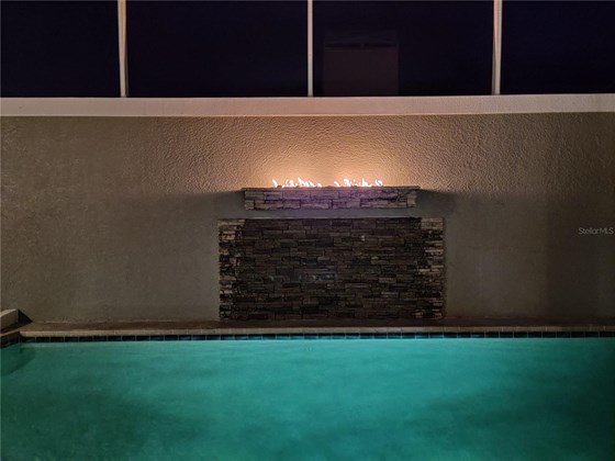Pool fire feature and lighting - Single Family Home for sale at 345 7th Ave N, Tierra Verde, FL 33715 - MLS Number is U8135988