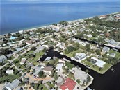 One of only 3 gulf access canals on Manasota Key. - Single Family Home for sale at 1345 Holiday Dr, Englewood, FL 34223 - MLS Number is C7449205