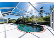 HUGE SCREENED CAGE AND POOL FOR RELAXING - Single Family Home for sale at 3400 Colony Ct, Punta Gorda, FL 33950 - MLS Number is C7451906