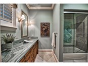 En-Suite Bathroom - Single Family Home for sale at 8499 Lindrick Ln, Bradenton, FL 34202 - MLS Number is A4475594