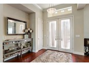 Pretty entrance way, and coat closet - Single Family Home for sale at 3501 Founders Club Dr, Sarasota, FL 34240 - MLS Number is A4497661