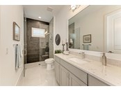 2nd ensuite guest bath - Single Family Home for sale at 602 Regatta Way, Bradenton, FL 34208 - MLS Number is A4499642