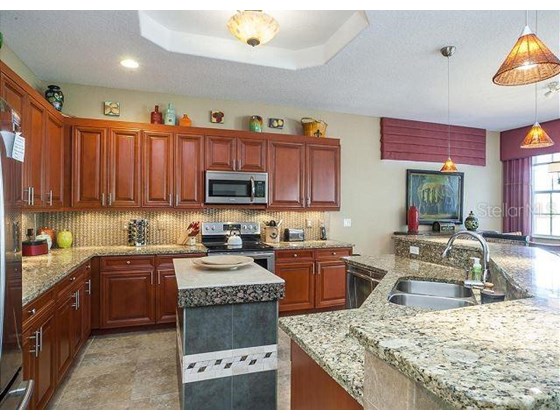 Kitchen 1 - Condo for sale at 2309 Avenue C #200, Bradenton Beach, FL 34217 - MLS Number is A4507199