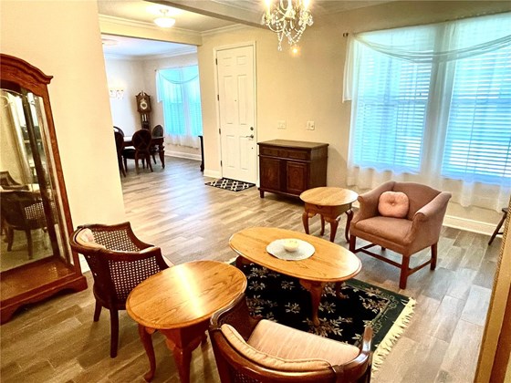 living room - Single Family Home for sale at 2005 Misty Sunrise Trl, Sarasota, FL 34240 - MLS Number is A4509875