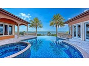 483 Meadow Lark Drive Sarasota FL 34236 Bird Key A4510572 - Open Bay 35ft infinity edge pool with mosaic tile - Single Family Home for sale at 483 Meadow Lark Dr, Sarasota, FL 34236 - MLS Number is A4510572