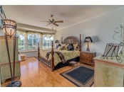 Spacious Master Bedroom with amazing views through full sized bay windows with window seat and storage. - Single Family Home for sale at 6521 Sundew Ct, Lakewood Ranch, FL 34202 - MLS Number is A4514104