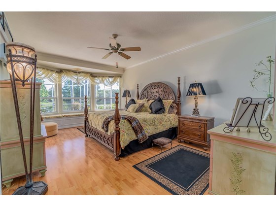Spacious Master Bedroom with amazing views through full sized bay windows with window seat and storage. - Single Family Home for sale at 6521 Sundew Ct, Lakewood Ranch, FL 34202 - MLS Number is A4514104