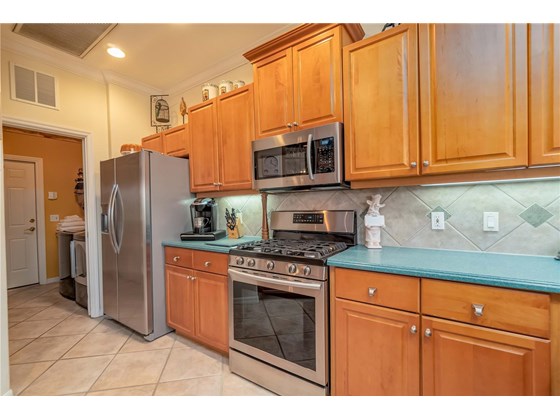 All New Stainless steel appliances.  Lots of counter space.  Pocket Door to Laundry Room. - Single Family Home for sale at 6521 Sundew Ct, Lakewood Ranch, FL 34202 - MLS Number is A4514104