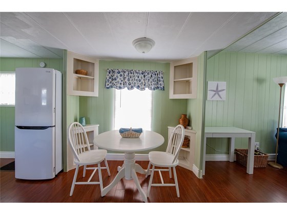 Eat in kitchen dining nook - Single Family Home for sale at 104 Portia St N, Nokomis, FL 34275 - MLS Number is A4514916