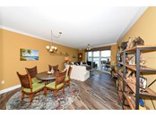 dining and living area - Condo for sale at 516 Tamiami Trl S #405, Nokomis, FL 34275 - MLS Number is A4517408