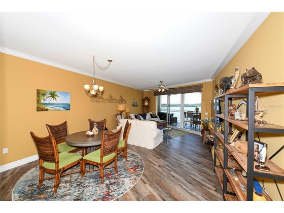 dining and living area - Condo for sale at 516 Tamiami Trl S #405, Nokomis, FL 34275 - MLS Number is A4517408