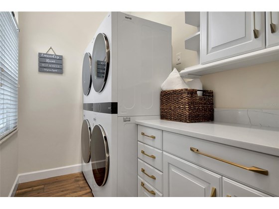 dual washer and dryers - Single Family Home for sale at 388 Bunker Hl, Osprey, FL 34229 - MLS Number is A4517543