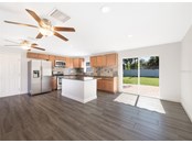 Kitchen and dining room is filled with natural light. - Single Family Home for sale at 3070 Hatton St, Sarasota, FL 34237 - MLS Number is A4518301