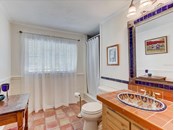 Bathroom off study - Single Family Home for sale at 5227 Siesta Cove Dr, Sarasota, FL 34242 - MLS Number is A4519271