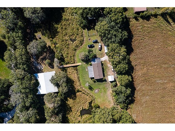 Aerial view of property - Single Family Home for sale at 16411 Waterline Rd, Bradenton, FL 34212 - MLS Number is A4519463