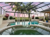 In the evening this lanai magically transforms into a relaxing tropical oasis - Single Family Home for sale at 1012 Bayview Dr, Nokomis, FL 34275 - MLS Number is A4521028