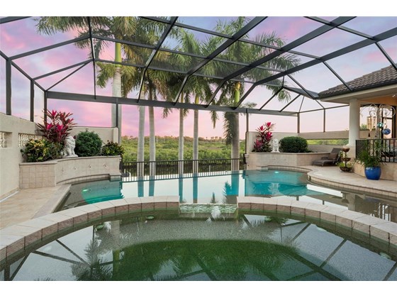 In the evening this lanai magically transforms into a relaxing tropical oasis - Single Family Home for sale at 1012 Bayview Dr, Nokomis, FL 34275 - MLS Number is A4521028