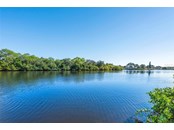 Long canal view of Shakett Creek, so tranquil - Single Family Home for sale at 1012 Bayview Dr, Nokomis, FL 34275 - MLS Number is A4521028