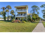 3 Back Porches facing the bay! - Single Family Home for sale at 6751 Portside Ln, Englewood, FL 34223 - MLS Number is N6118322