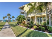 Walkway out to Community Pool on the Bay! It's almost like your own pool! - Single Family Home for sale at 6751 Portside Ln, Englewood, FL 34223 - MLS Number is N6118322