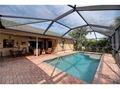 large pool and lanai area - Single Family Home for sale at 10 Pine Ridge Way, Englewood, FL 34223 - MLS Number is N6118641