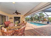 great lanai and pool area - Single Family Home for sale at 10 Pine Ridge Way, Englewood, FL 34223 - MLS Number is N6118641